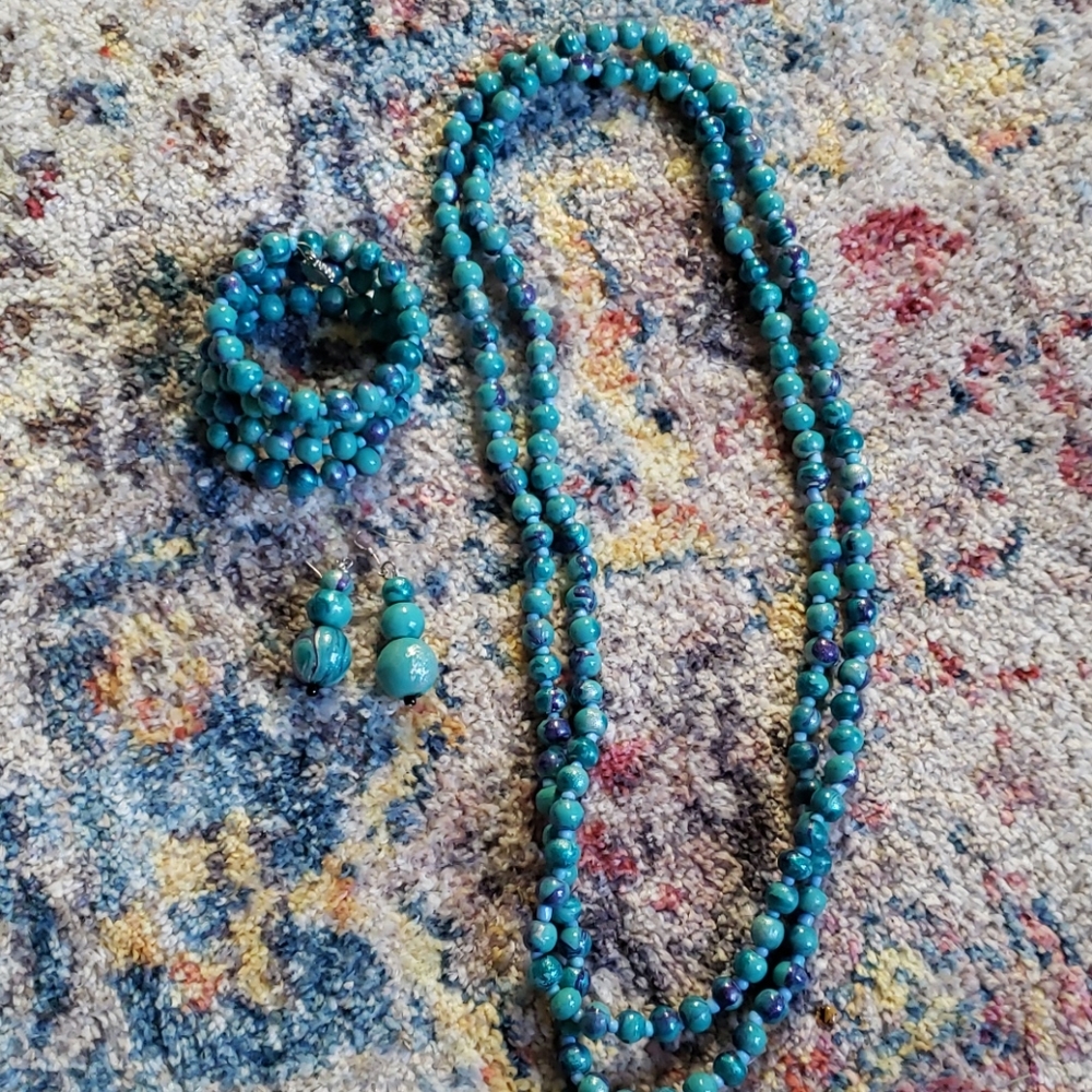 NWOT Teal & Purple set